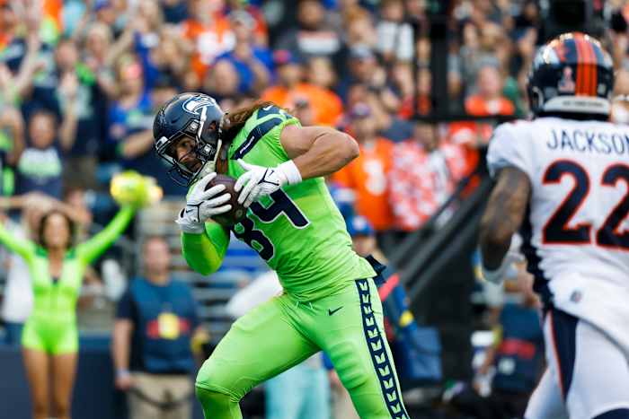 Seattle Seahawks tight end Colby Parkinson (84) catches a touchdown pass against the Denver Broncos during the second quarter at Lumen Field.